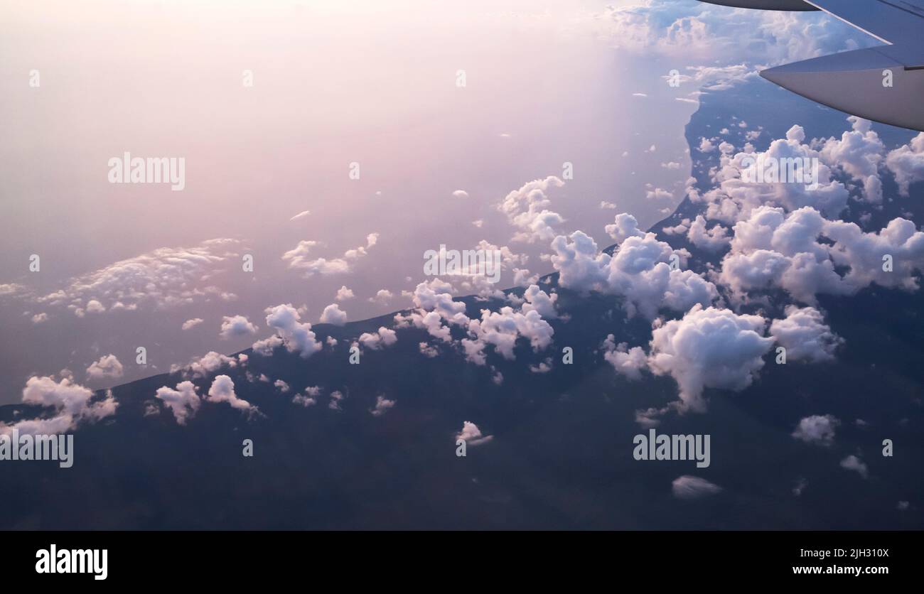 Coastline and clouds seen flying somewhere over Baltic Sea region in ...