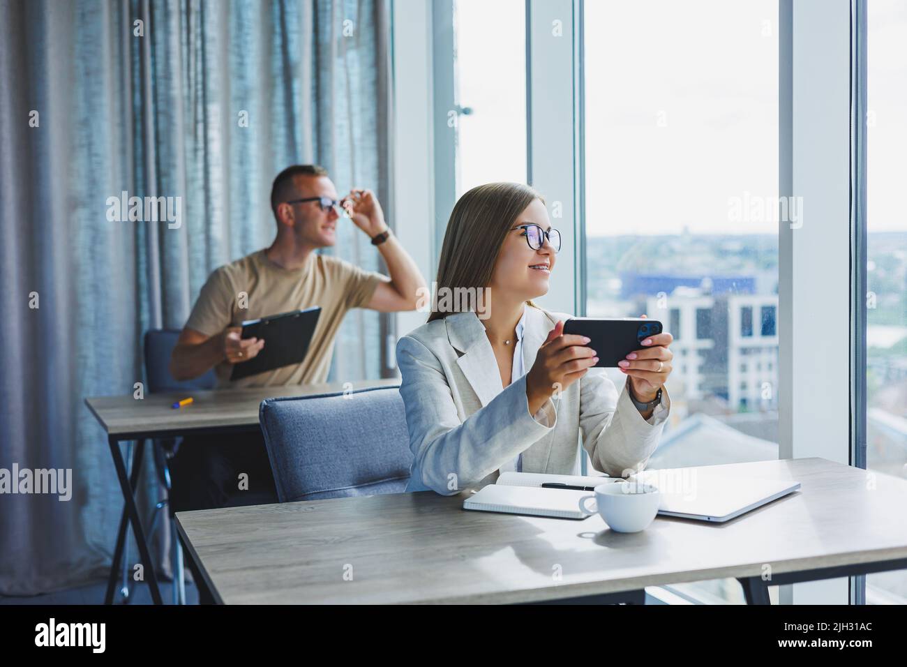 Portrait of a female manager in formal attire doing office work and