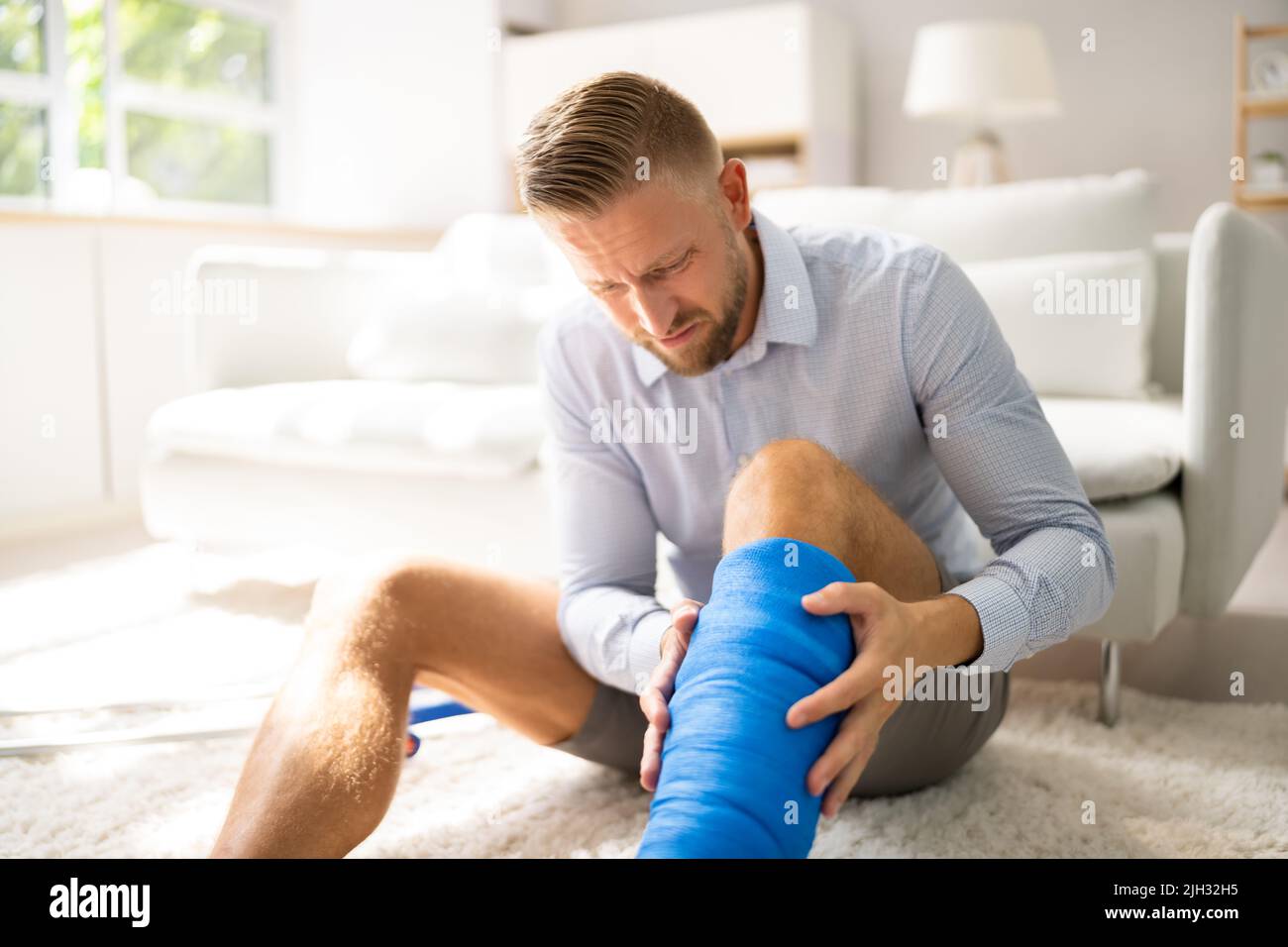 Man With Broken Leg, Cast And Crutches Stock Photo Alamy