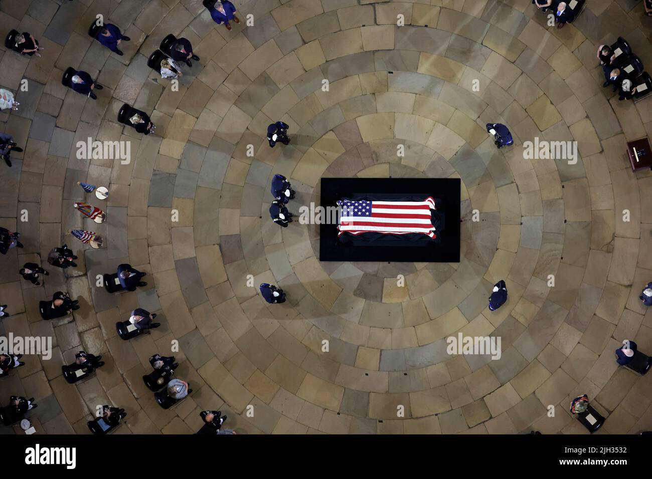 Washington DC, USA. 14th July, 2022. WASHINGTON, DC - JULY 14: The U.S. Capitol Police Honor Guard salutes World War II veteran and Medal of Honor recipient Herschel 'Woody' Williams as he lays in honor in the center of the United States Capitol Rotunda during a Congressional tribute ceremony on July 14, 2022 in Washington, DC. The last living WWII combat veteran to have receive the Medal of Honor, Williams was a Marine corporal during the Battle of Iwo Jima in 1945 when he used his flamethrower to destroy numerous enemy pillboxes while under intense incoming fire for more than four hours. Cre Stock Photo