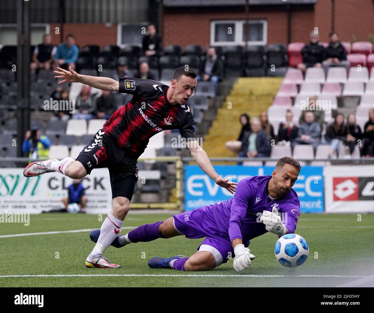 Crusaders’ Paul Heatley in action against FCB Magpies’ Matthew Silva during the UEFA Europa Conference League First Qualifying Round second leg match at Seaview, Belfast. Picture date: Thursday July 14, 2022. Stock Photo