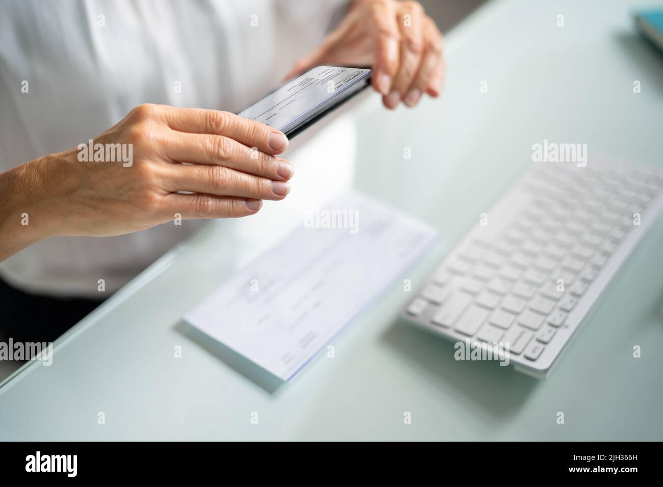 Remote Cheque Deposit Using Mobile Phone. Check Capture Stock Photo Alamy