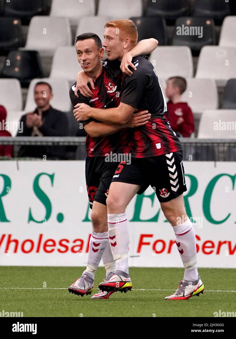 Crusaders’ Paul Heatley (left) celebrates scoring his sides forth goal during the UEFA Europa Conference League First Qualifying Round second leg match at Seaview, Belfast. Picture date: Thursday July 14, 2022. Stock Photo