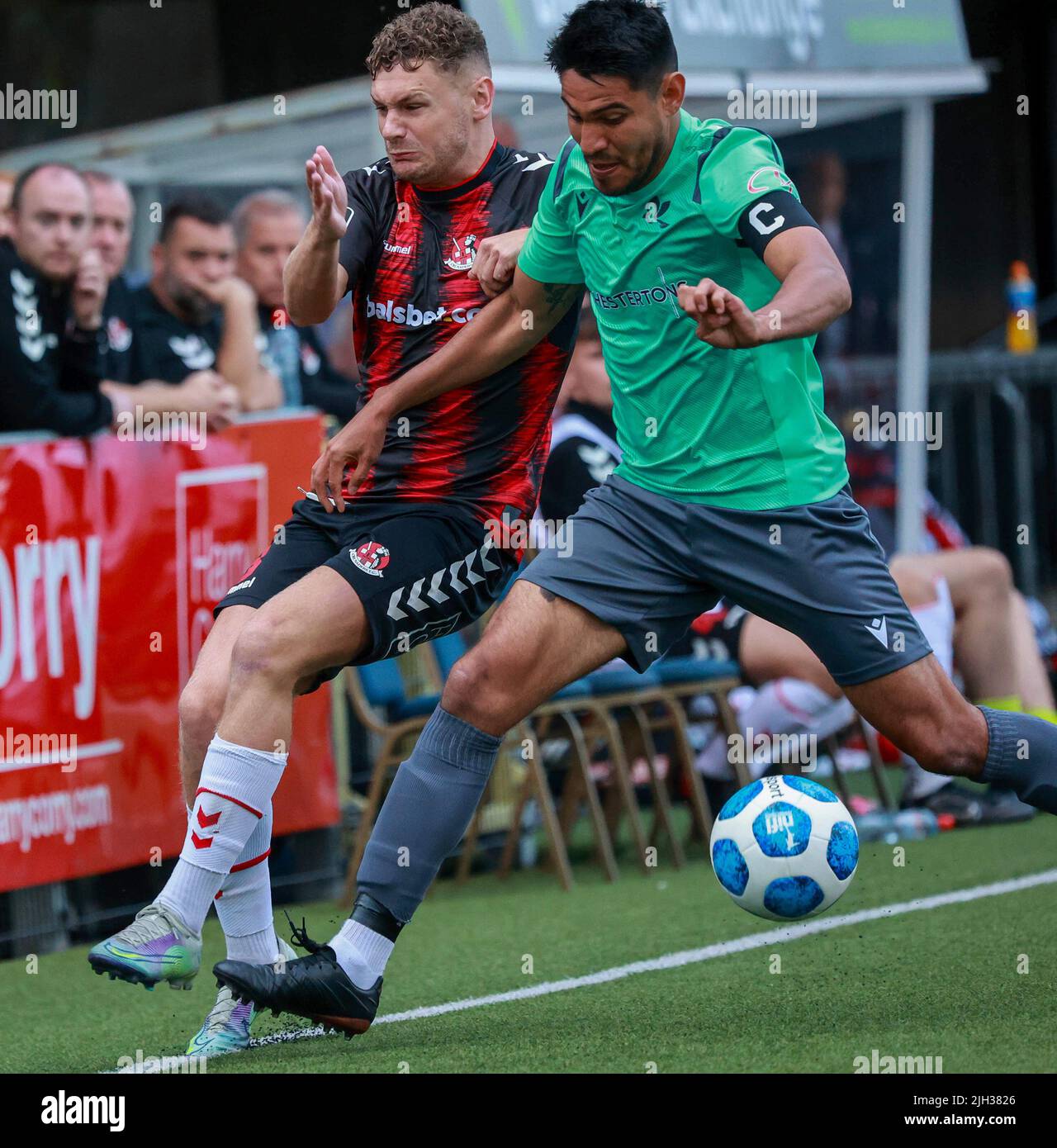 Seaview, Belfast, Northern Ireland, UK. 14 July 2022. UEFA Conference League First Qualifying Round  (second leg) – Crusaders v Magpies. Action from tonight's game at Seaview (Crusaders in red/black). Crusaders Ben Kennedy and Zuniga.Credit: CAZIMB/Alamy Live News. Stock Photo
