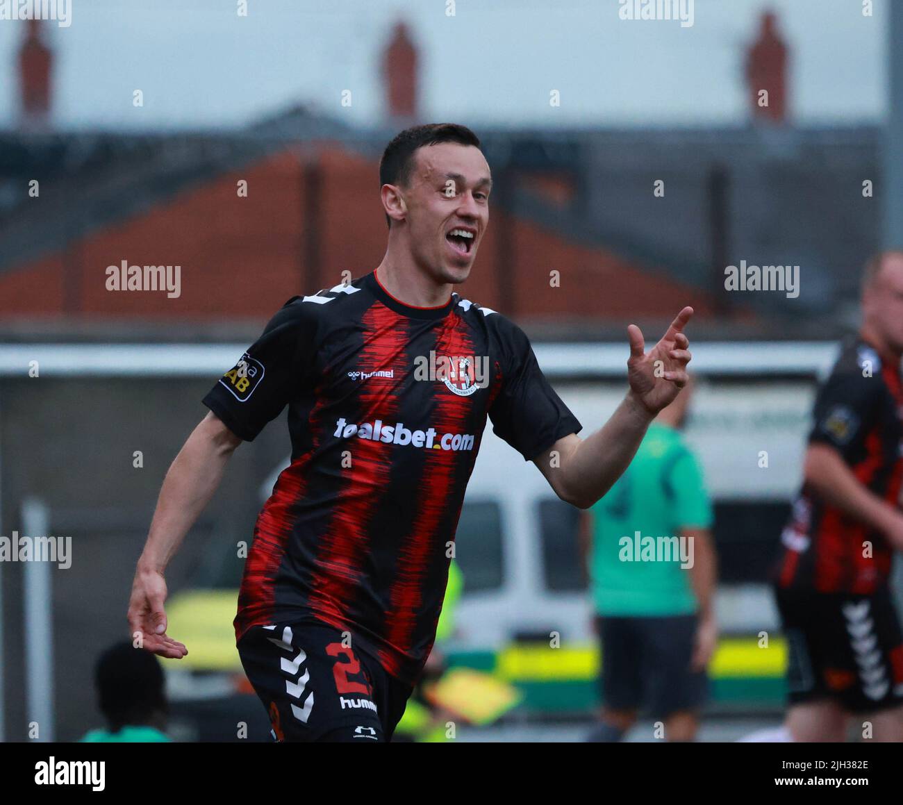 Seaview, Belfast, Northern Ireland, UK. 14 July 2022. UEFA Conference League First Qualifying Round  (second leg) – Crusaders v Magpies. Action from tonight's game at Seaview (Crusaders in red/black). Paul Heatley (22) scoring and celebrating the opening goal. Credit: CAZIMB/Alamy Live News. Stock Photo