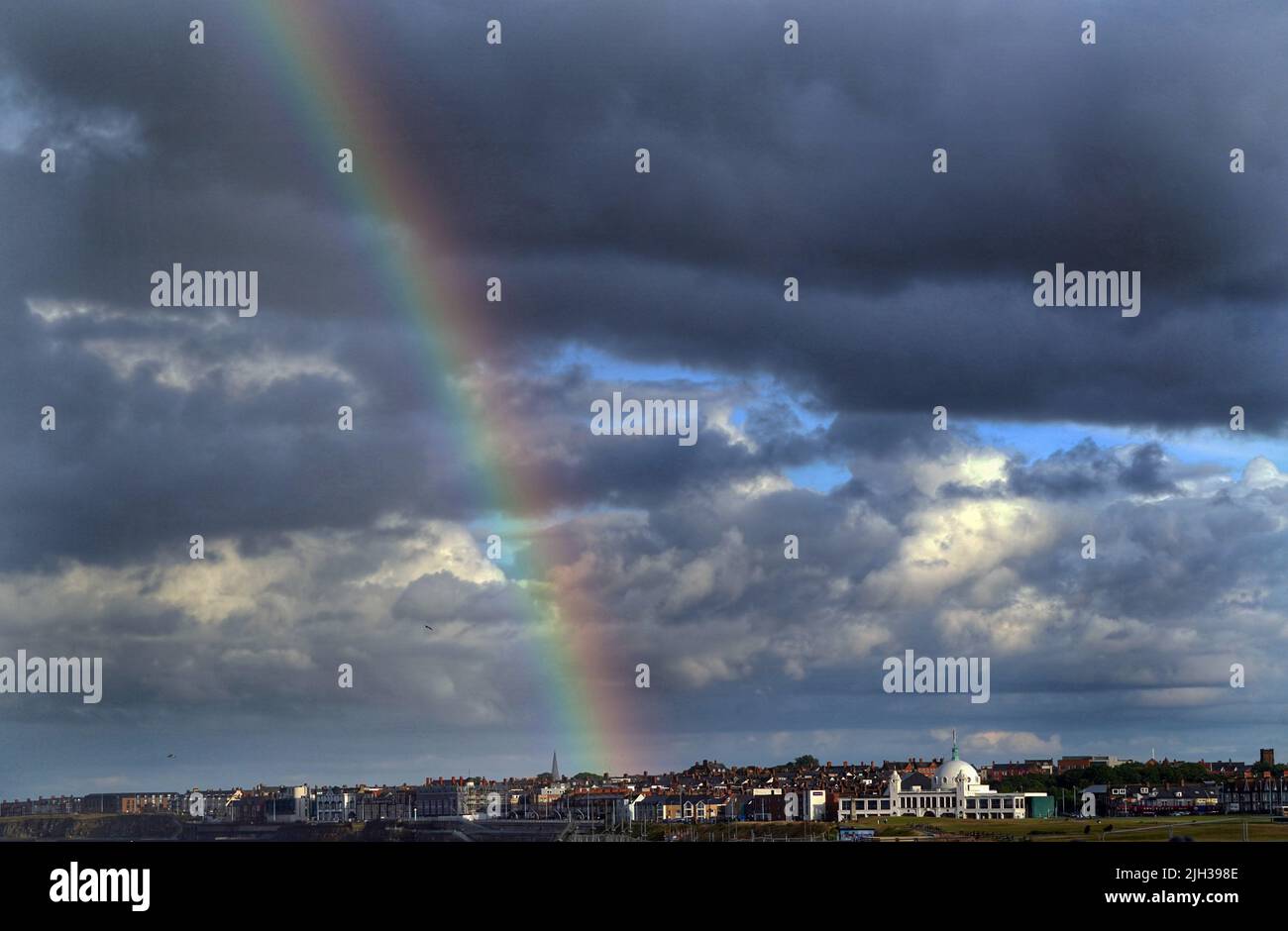 A rainbow over Spanish City in Whitley Bay in North Tyneside, Tyne and Wear. Picture date: Thursday July 14, 2022. Stock Photo