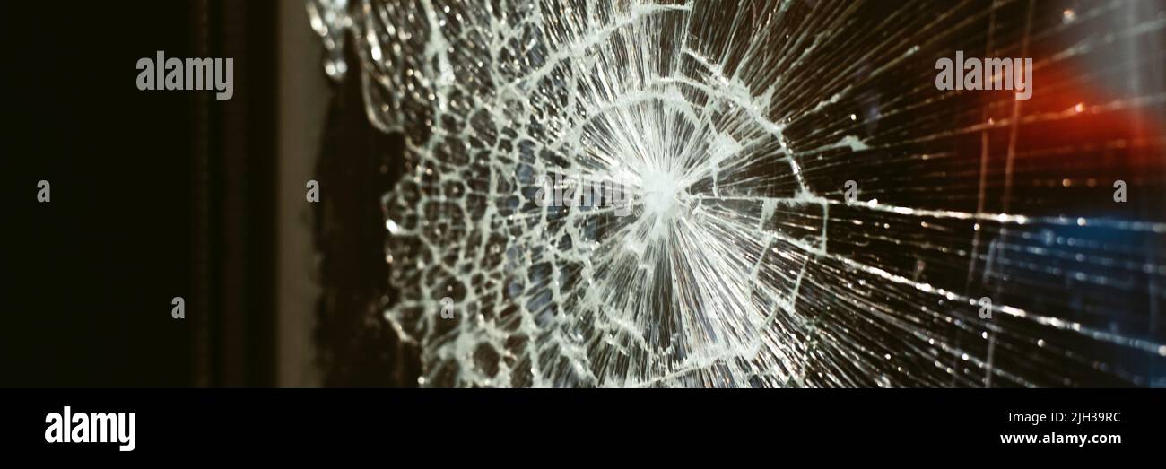broken glass against the background of the night city and night lights ...