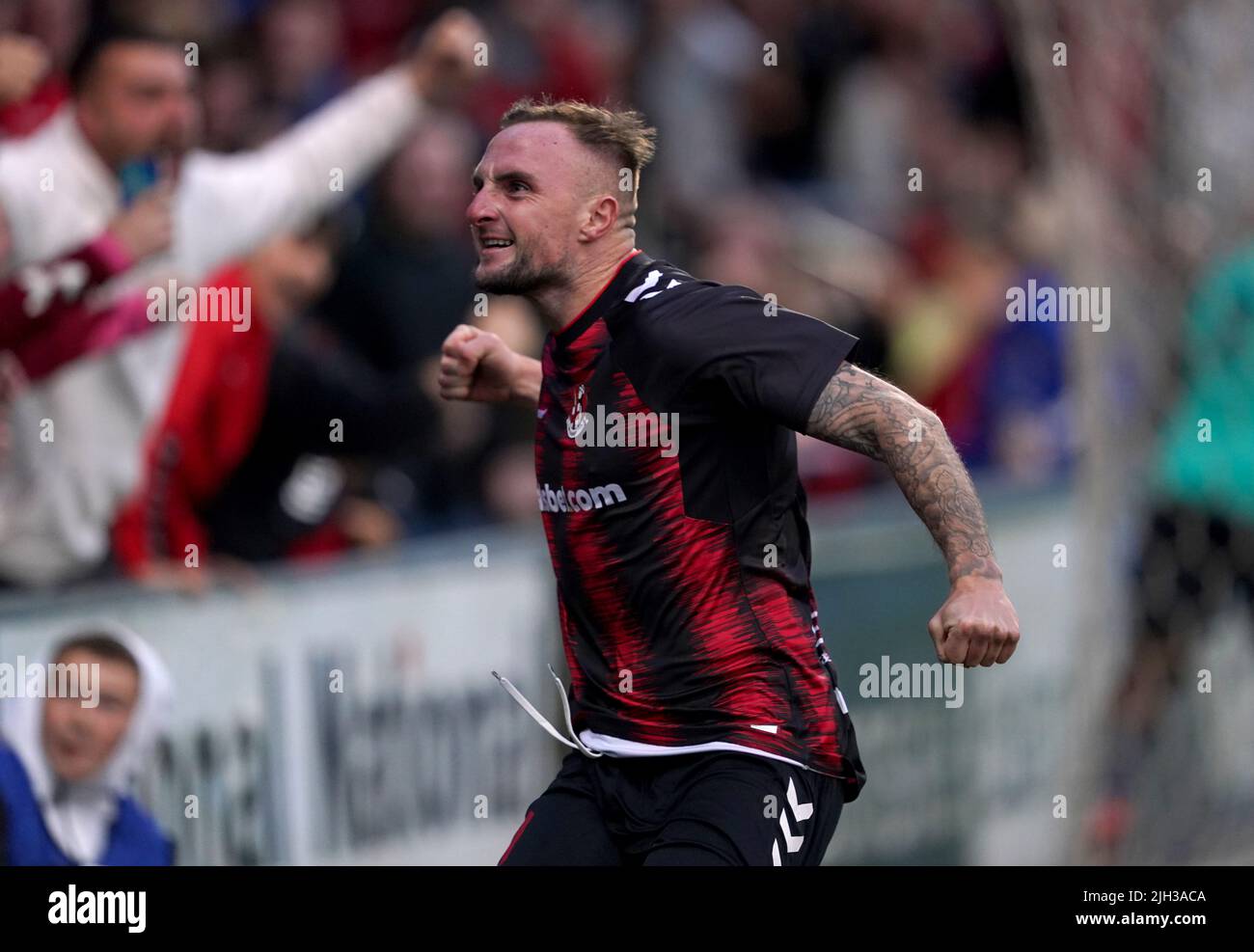 Crusaders’ Jude Winchester celebrates scoring his sides second goal during the UEFA Europa Conference League First Qualifying Round second leg match at Seaview, Belfast. Picture date: Thursday July 14, 2022. Stock Photo