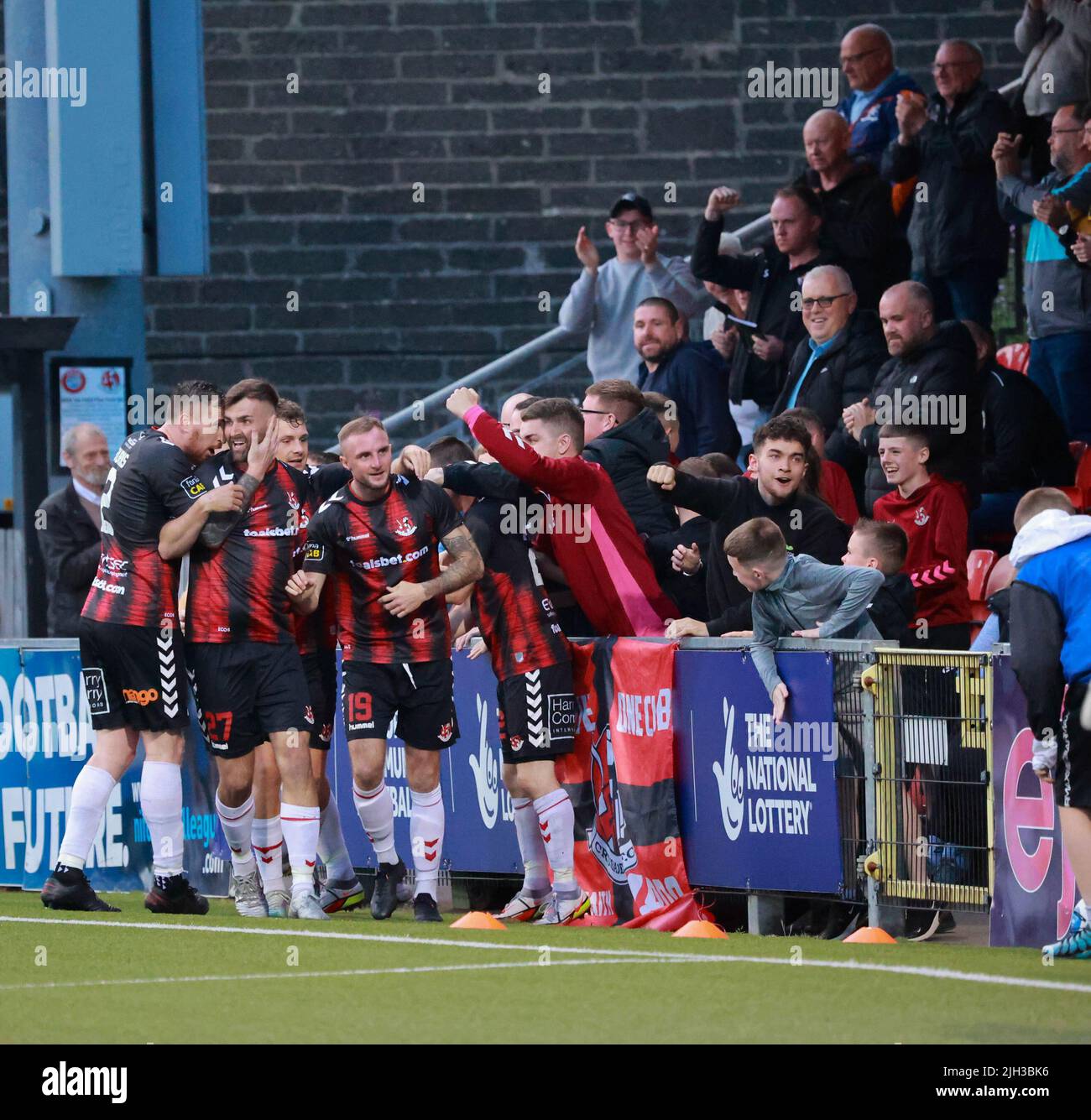 Seaview, Belfast, Northern Ireland, UK. 14 July 2022. UEFA Conference League First Qualifying Round  (second leg) – Crusaders v Magpies. Action from tonight's game at Seaview (Crusaders in red/black). Substitute Jude Winchester (19) levels the tie for Crusaders.Credit: CAZIMB/Alamy Live News. Stock Photo