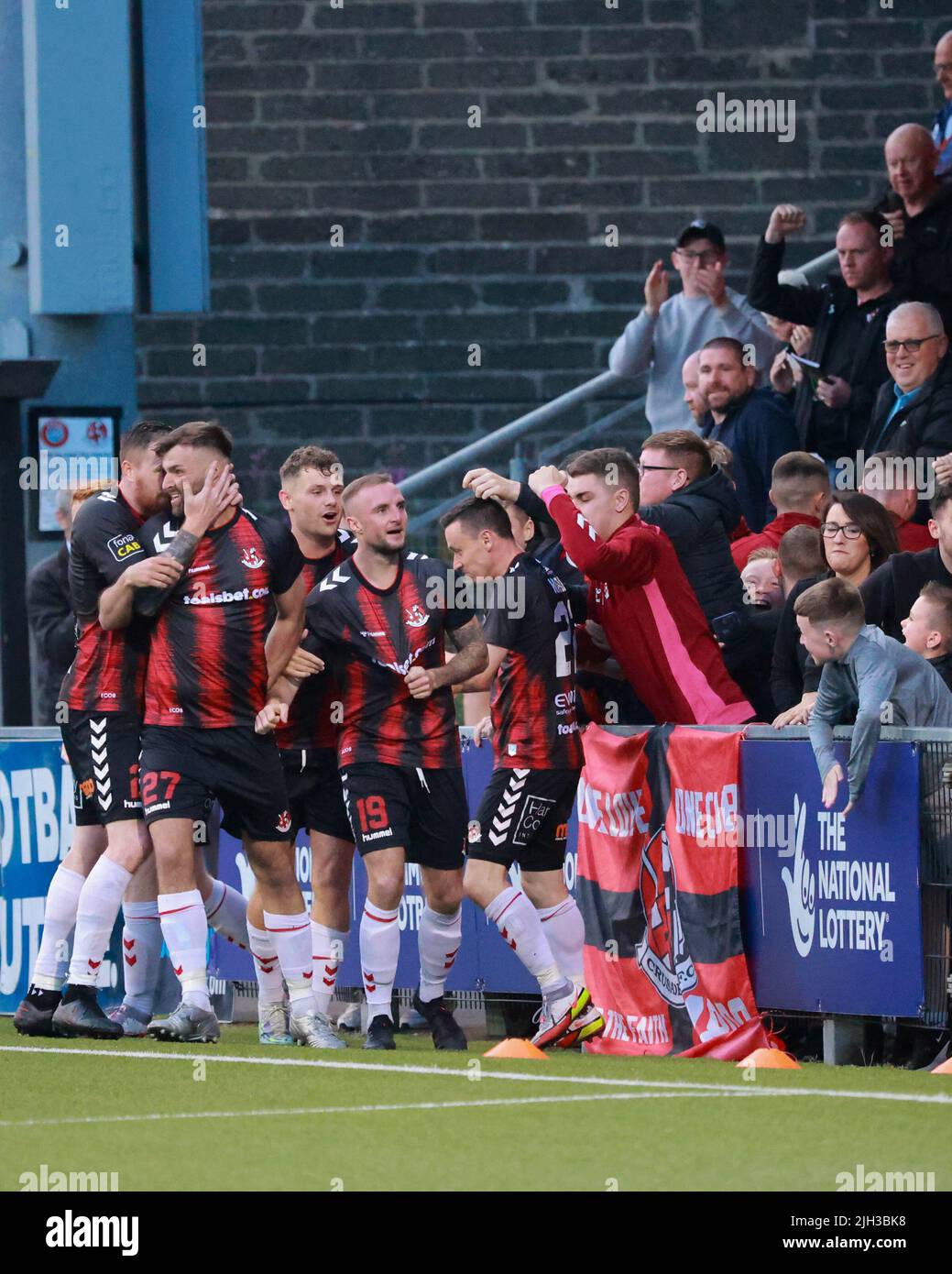 Seaview, Belfast, Northern Ireland, UK. 14 July 2022. UEFA Conference League First Qualifying Round  (second leg) – Crusaders v Magpies. Action from tonight's game at Seaview (Crusaders in red/black). Substitute Jude Winchester (19) levels the tie for Crusaders.Credit: CAZIMB/Alamy Live News. Stock Photo