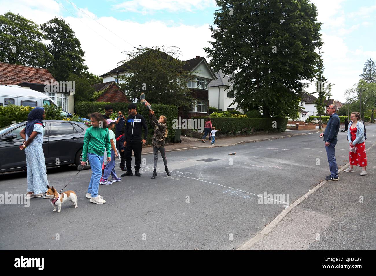 Girl Playing Game Welly Wanging at Street Party Celebrating Queen Elizabeth II Platinum Jubilee Surrey England Stock Photo