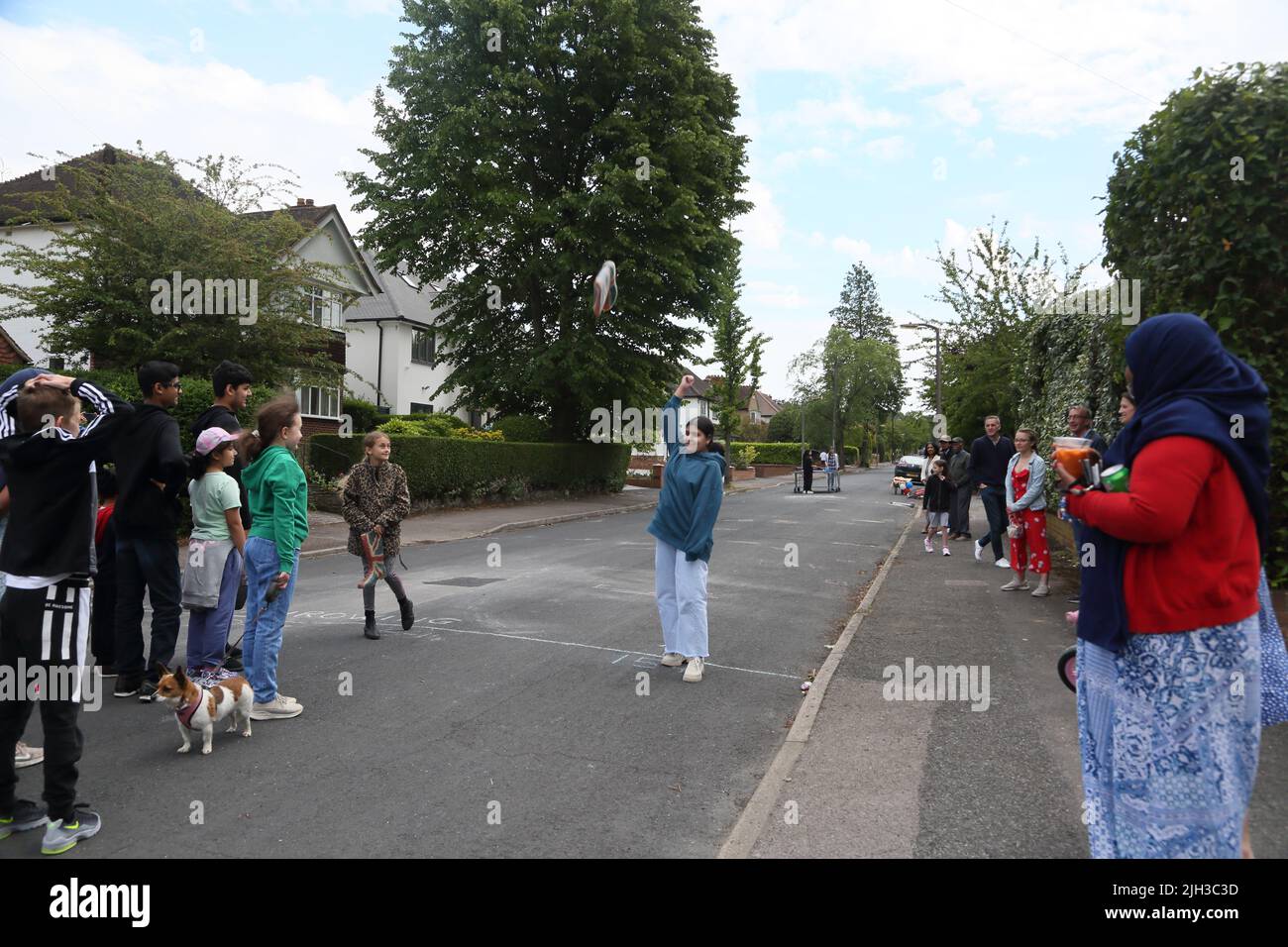 Girl Welly Wanging at Street Party Celebrating Queen Elizabeth II Platinum Jubilee Surrey England Stock Photo