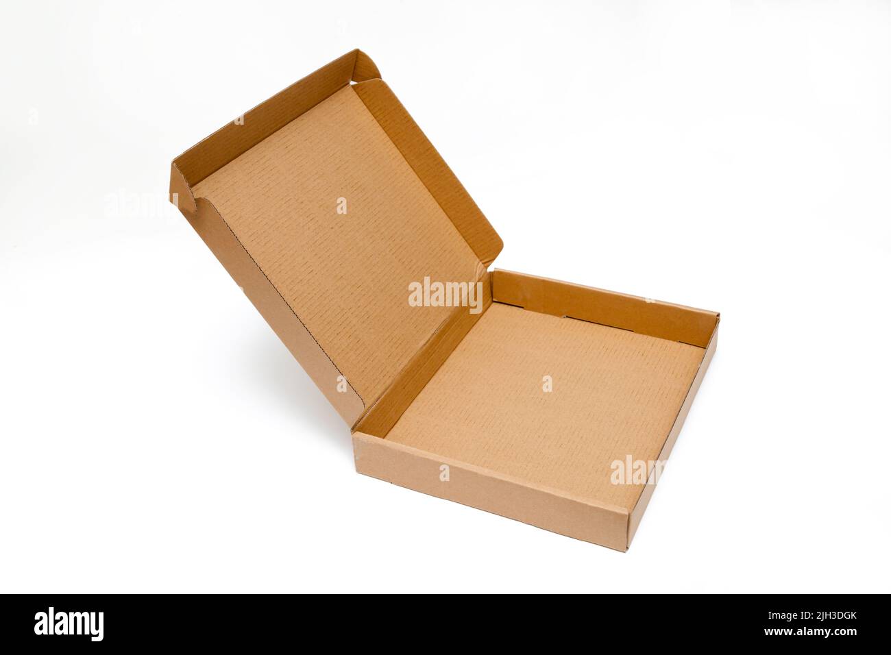 low cardboard box with hinged lid isolated on white background