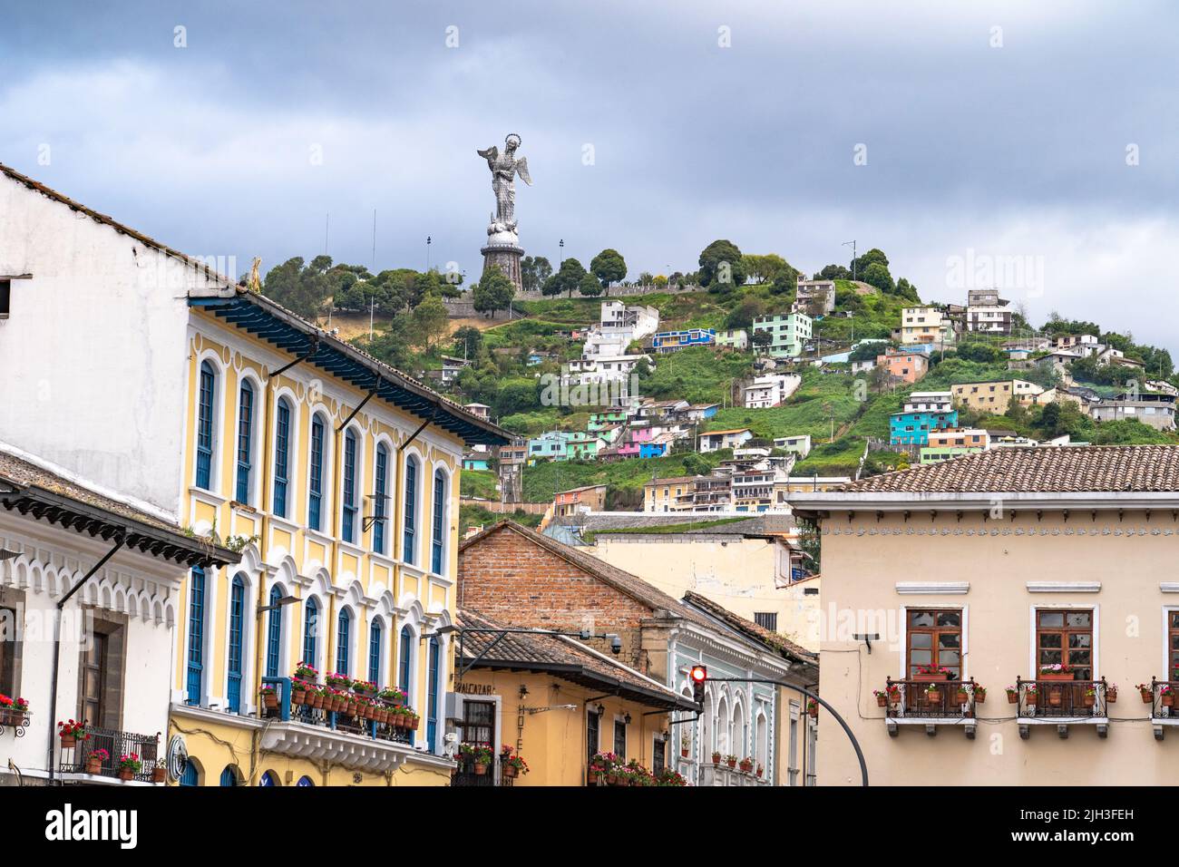 In central Quito, Ecuador there are museums, churches and a tall aluminum sculpture of the Virgin de El Panecillo, Virgin Mary with wings on hilltop Stock Photo