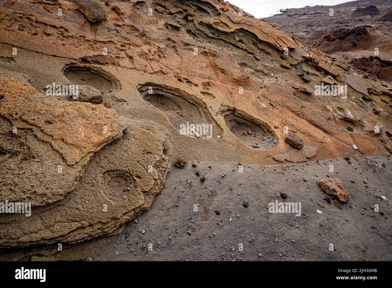 Volcanic landscape looks like craters on the moon on Bartolome Island in the Galapagos Stock Photo