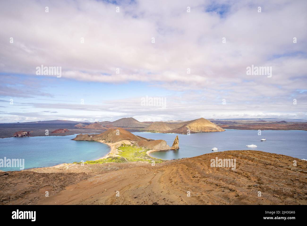 Scenic landscape of Galapagos archipelago with Pinnacle Rock on Bartolome Island view from summit trail Stock Photo