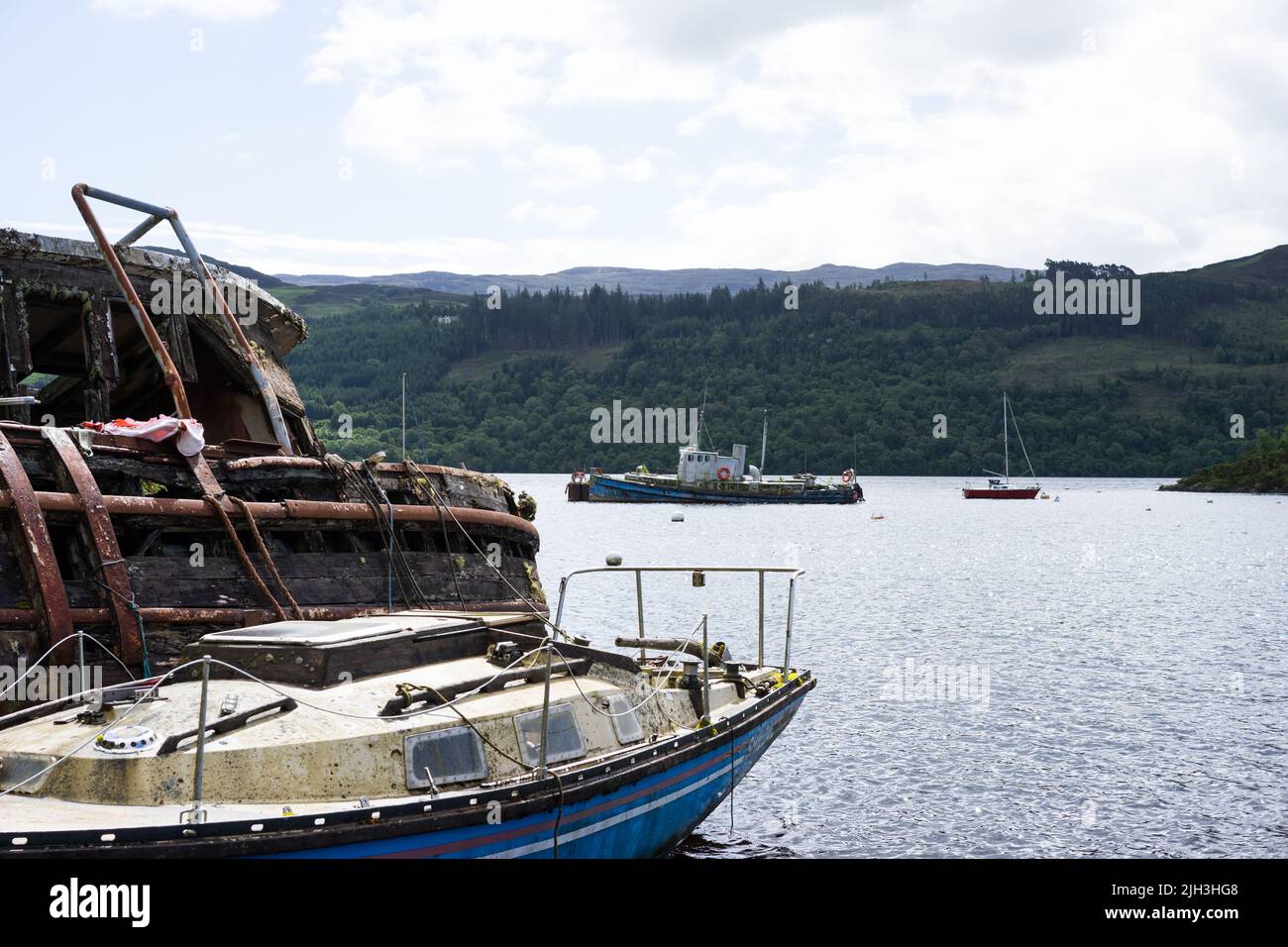 Old Deserted boats at Inchnacardoch Bay near Fort Agustus, Loch Ness, Scotland, UK. Stock Photo