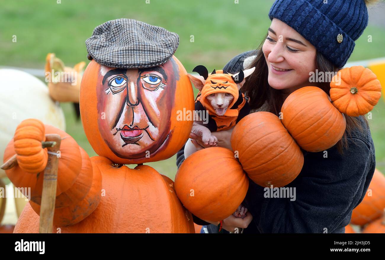 Pumpkinson Farm Rosie Higgins, pumpkin creator, with Seth her pet