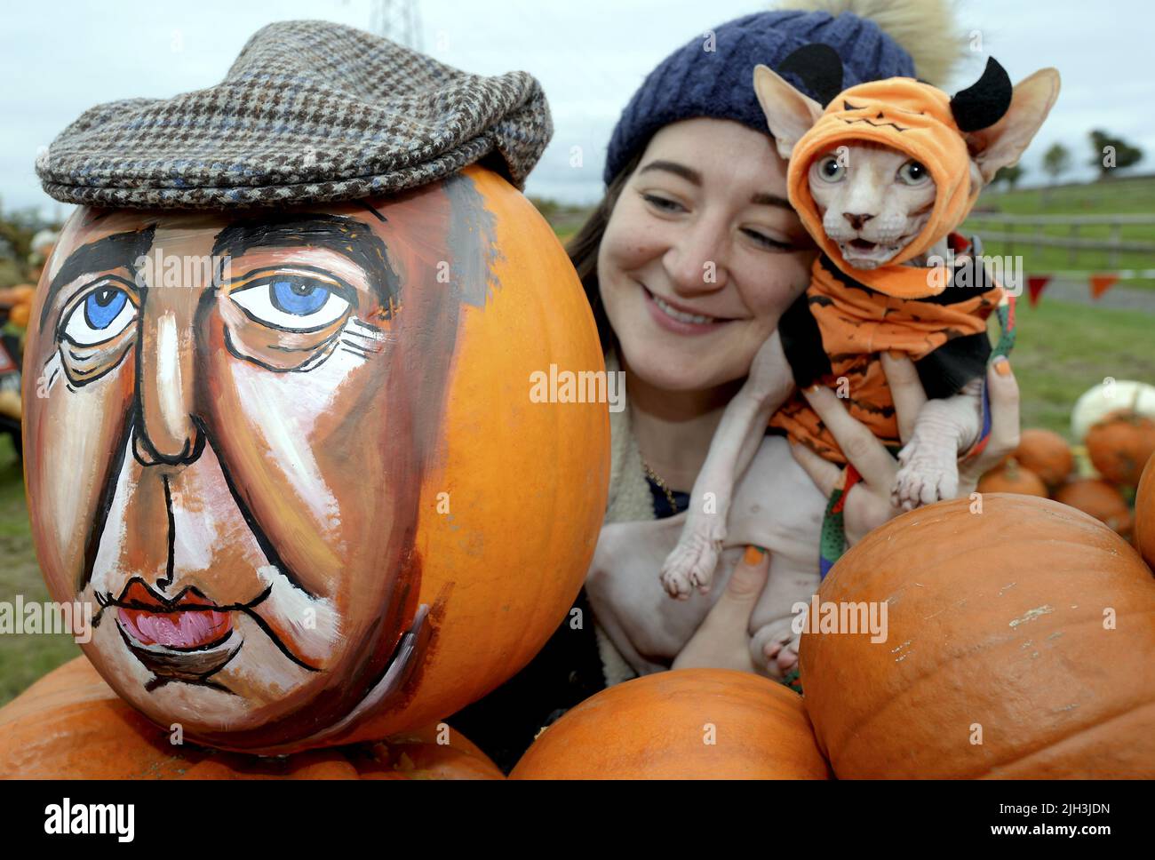 Pumpkinson Farm Rosie Higgins, pumpkin creator, with Seth her pet