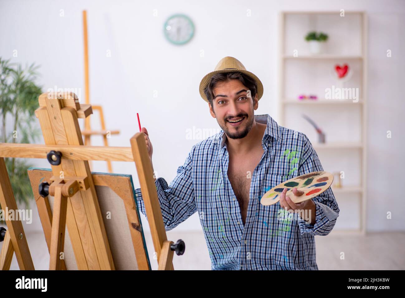 Portrait joyful young man paint hi-res stock photography and images - Alamy
