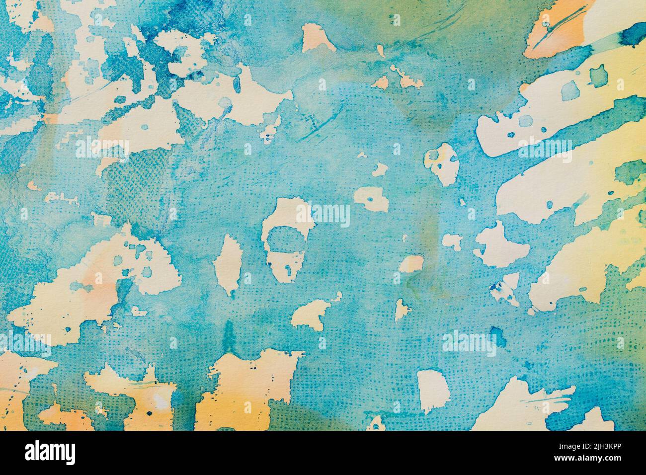blue and yellow painted watercolor on paper background texture Stock Photo