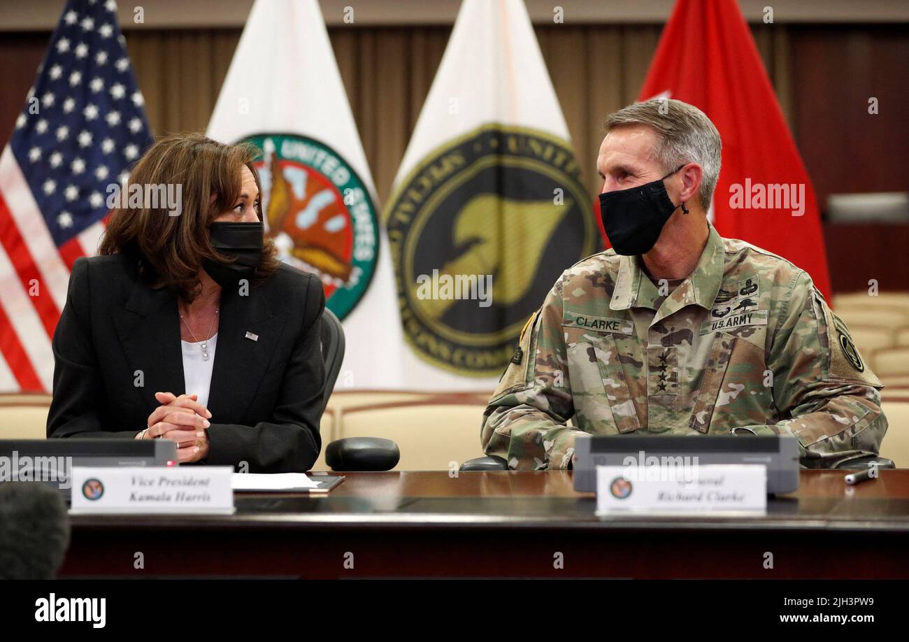 U.S. Vice President Kamala Harris speaks with General Richard D. Clarke, Commander of the U.S. Special Operations Command, as she takes part in a briefing with Generals of the Central Command (CENTCOM) and of the Special Operations Command (SOCOM) during her visit to the Central Command, in Tampa, Florida, U.S., July 14, 2022. REUTERS/Octavio Jones Stock Photo