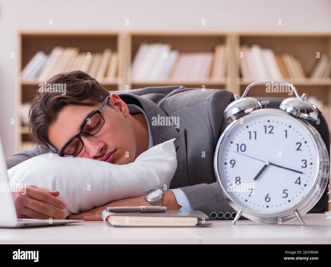 The tired man sleeping at home having too much work Stock Photo Alamy