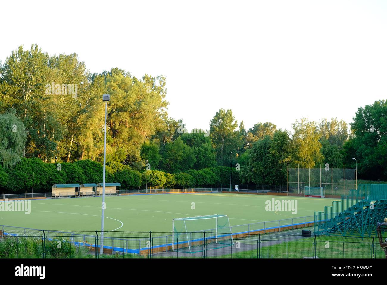 Empty high school football field with green grass Stock Photo