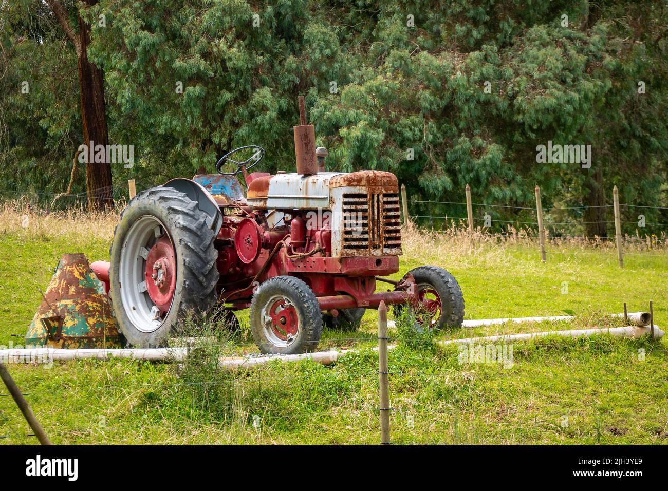 Santa Elena, Antioquia, Colombia May 17 2022 Red Tractor in a Green