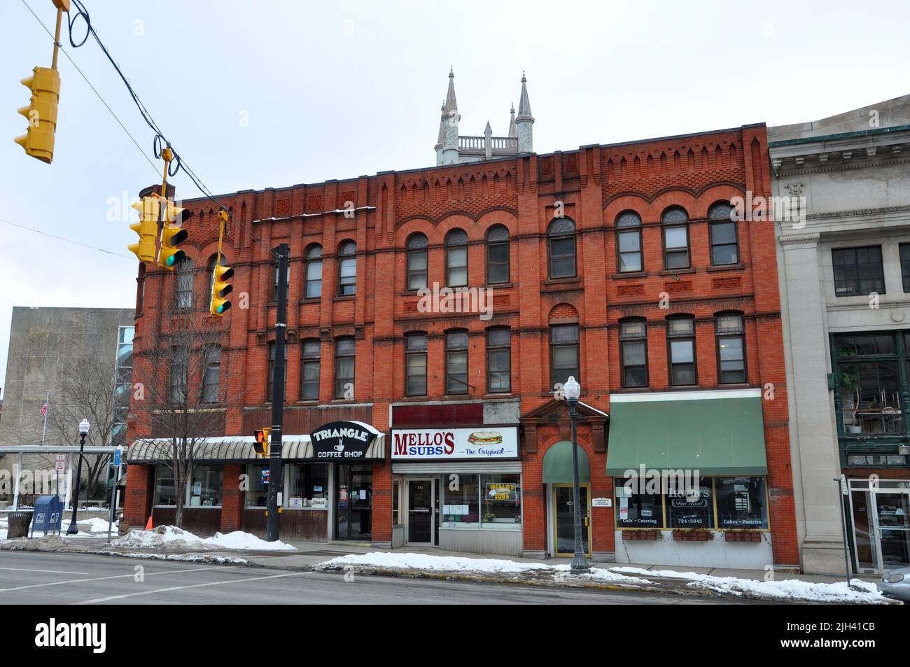 Historic commercial building on Lower Genesee Street at Washington Street in downtown Utica, New York State NY, USA. This area is a National Register Stock Photo