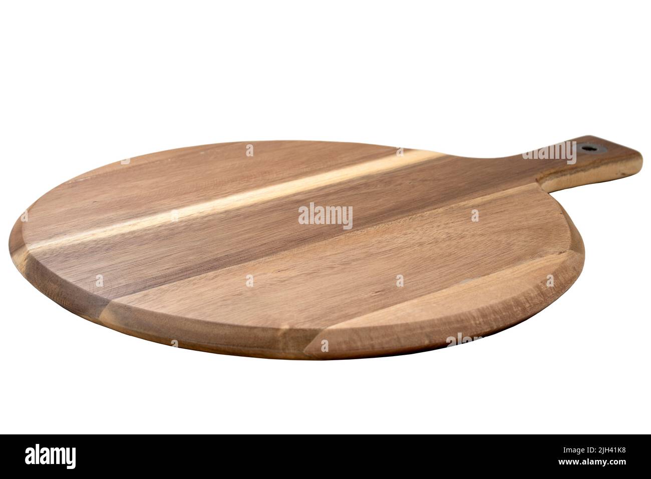 Food preparation tool, pizza platter and kitchen utensil concept with close-up on disk shaped wood chopping board with round corners isolated on white Stock Photo