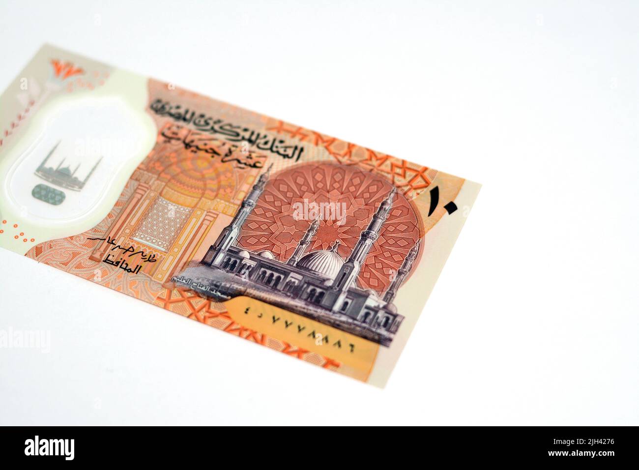 Selective focus of obverse side of the new first Egyptian 10 LE EGP ten pounds plastic polymer banknote features Administrative capital's grand mosque Stock Photo