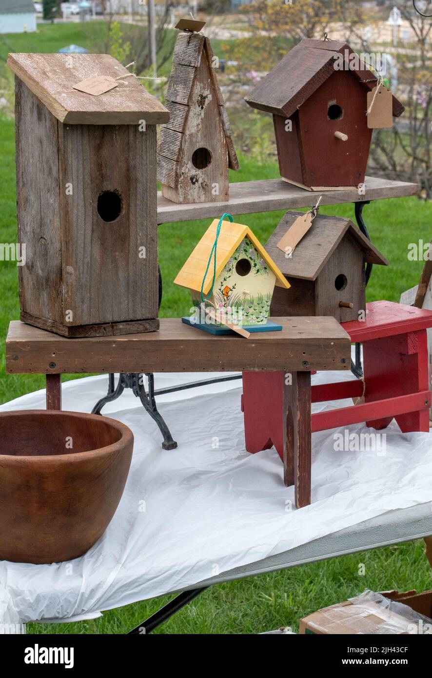 Collection of rustic wooden bird houses, for sale at an outdoor arts and crafts show Stock Photo