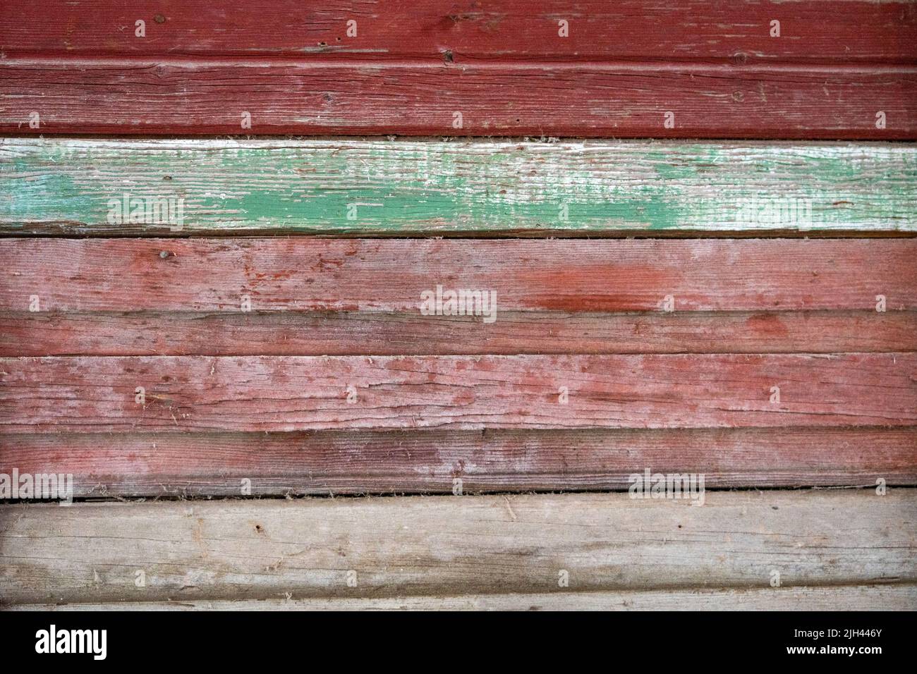 weathered wood on an old barn, makes a beautiful background with a rustic holiday flair Stock Photo
