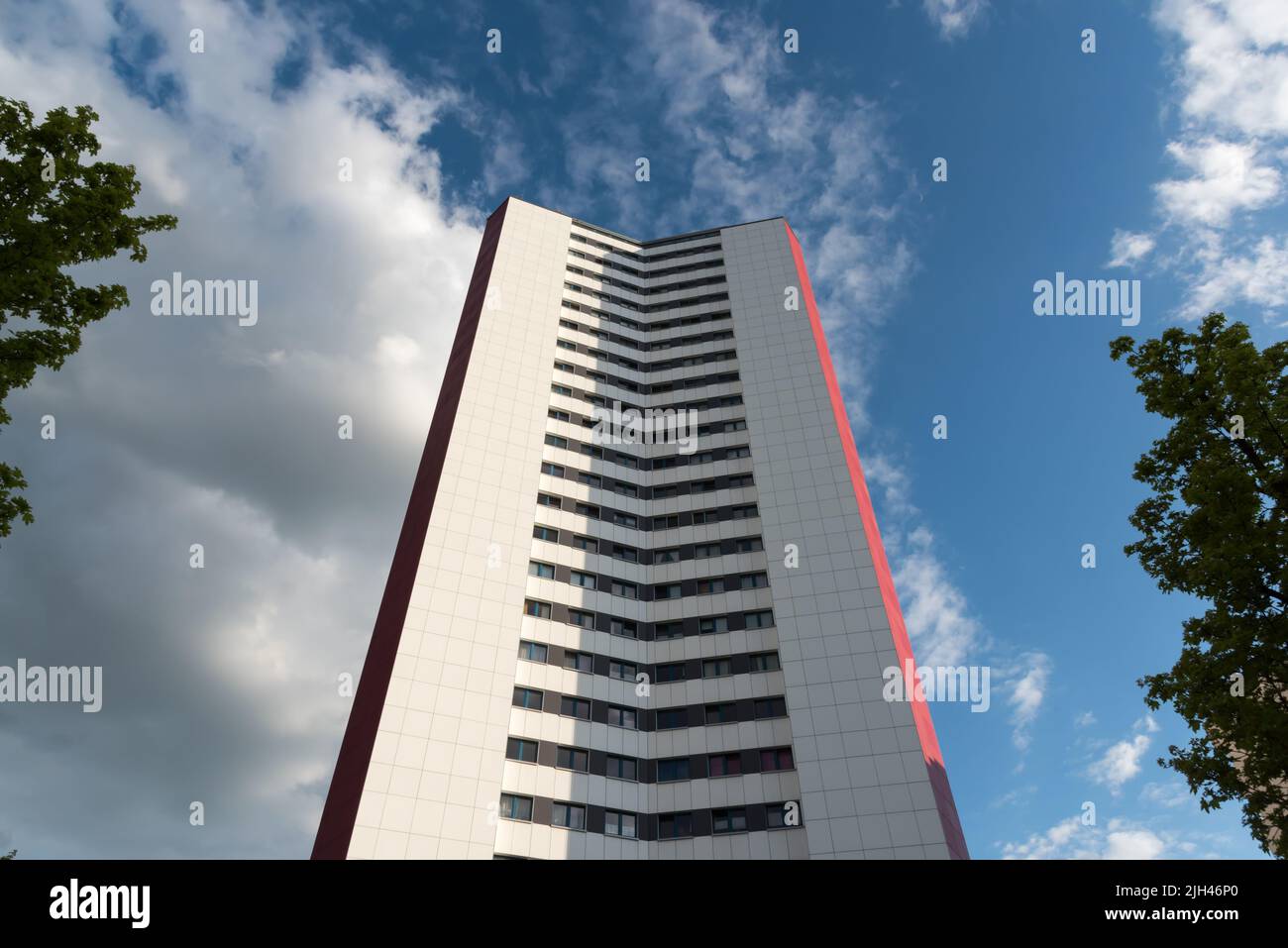A red and gray skyscraper in the capital Berlin Stock Photo