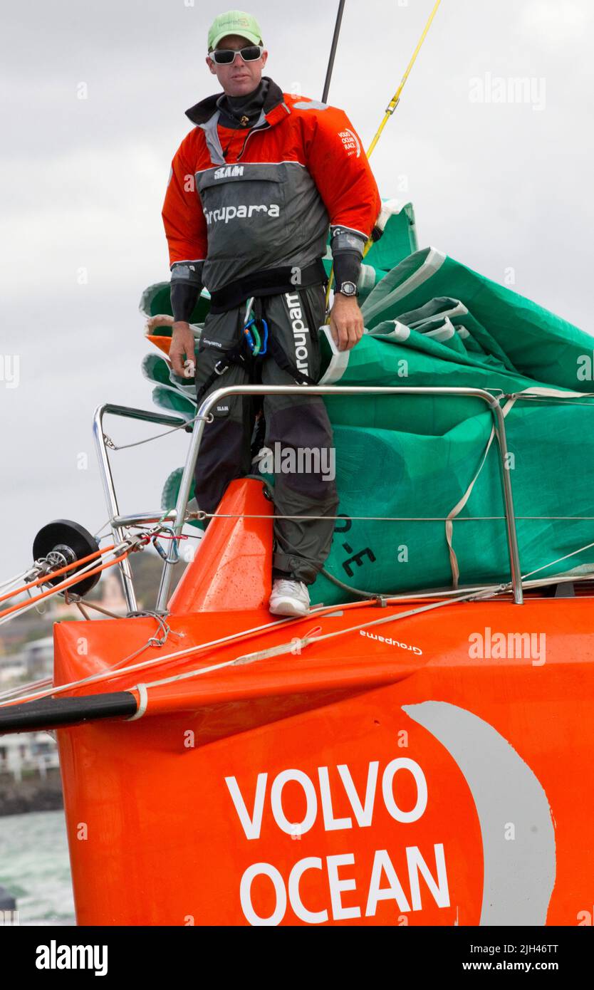 Groupama Sailing Team bowman Brad Marsh keeps watch as the team compete in the in-port race as part of the Volvo Ocean Race, Auckland, New Zealand, Sa Stock Photo
