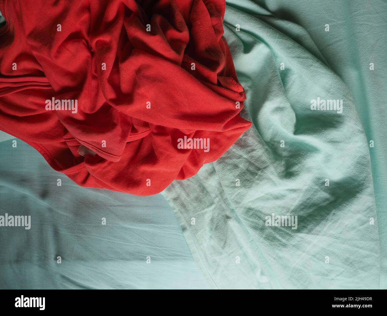 red and light green fabric texture useful as a background Stock Photo