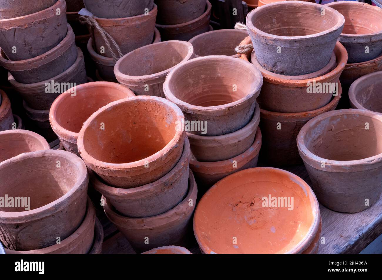 Vintage flower pots at Perch Hill garden in July East Sussex UK Stock Photo