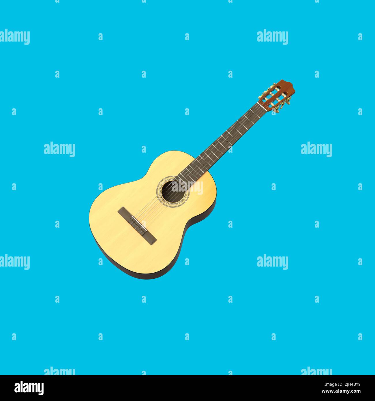 Classical Guitar on Blue Background Stock Photo
