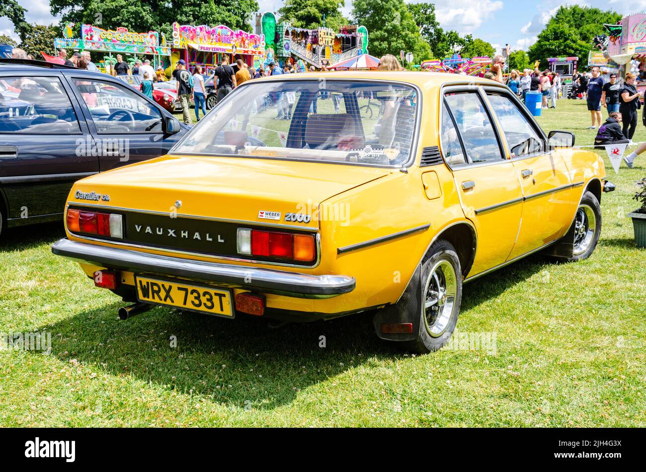 Rear view of a 1978 Mark 1 Vauxhall Cavalier 2000GL in yellow at The Berkshire Motor Show  in Reading, UK Stock Photo