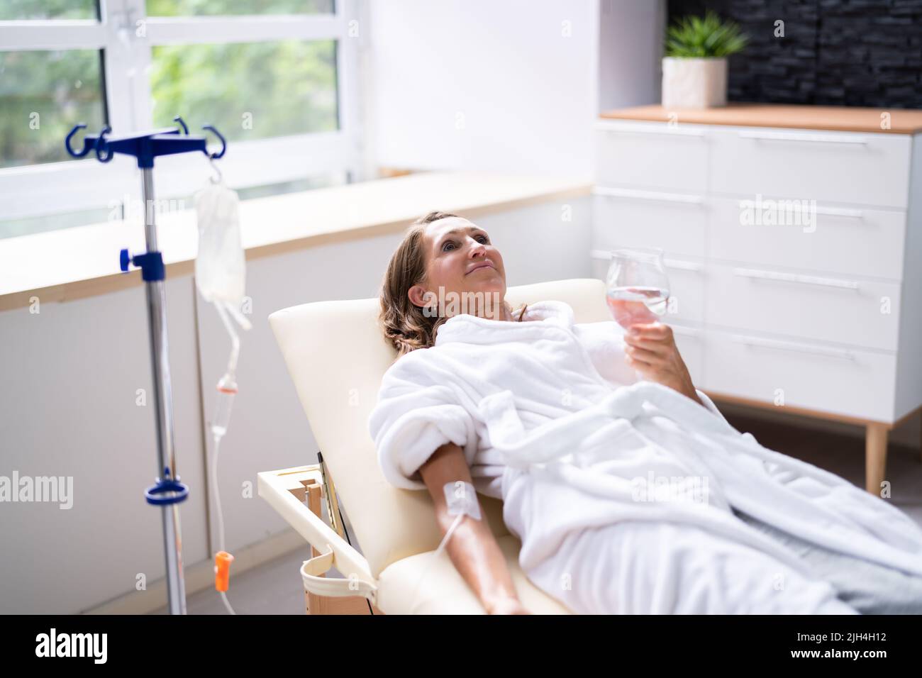 Vitamin Therapy Iv Drip Infusion In Women Blood Stock Photo