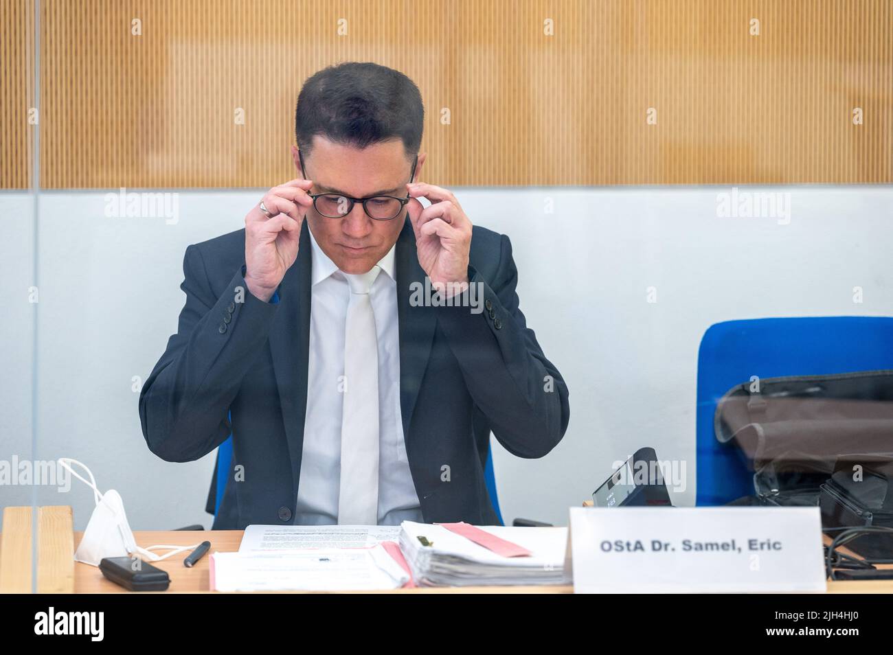 Trier, Germany. 15th July, 2022. Senior Public Prosecutor Eric Samel sits in the courtroom of the Regional Court at the trial of the fatal rampage in Trier. He is giving his plea in the so-called spree driver trial. A man had raced through the city center in a car on December 1, 2020, killing five people. Credit: Harald Tittel/dpa/Alamy Live News Stock Photo