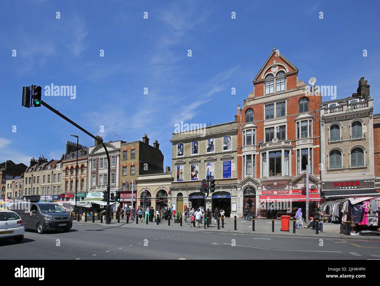 Entrance to Whitechapel Station on Mile End Road, London, UK. Victorian station building now serves Underground, Overground and Elizabeth Line trains Stock Photo