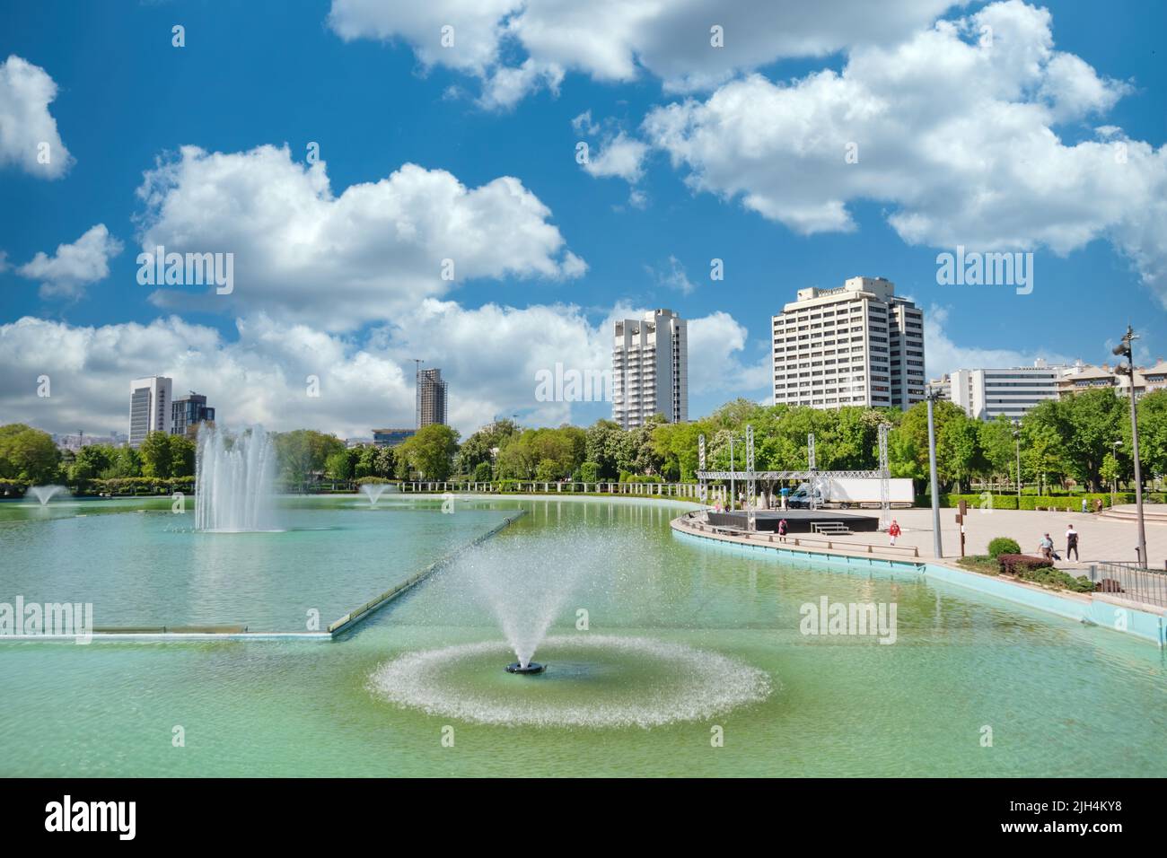View from the pond at Genclik Parki, a public park with cultural center, youths' center, theme park, convention halls at the center of Ankara, Turkey Stock Photo