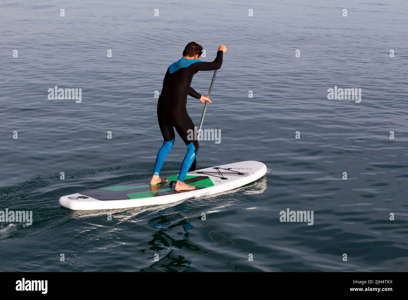 Practice of Stand Up Paddle in the Mediterranean. Carnon, Occitanie, France Stock Photo