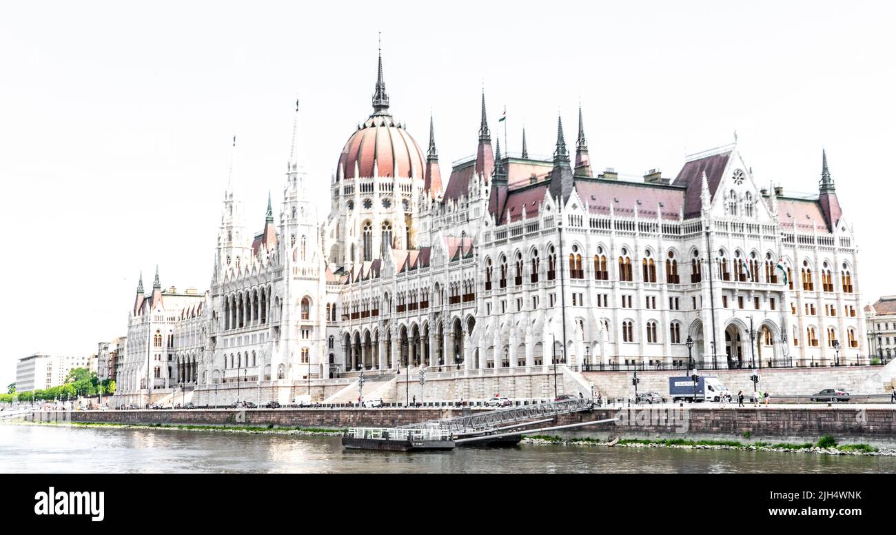 Looking at the iconic Hungarian parliament building -Országház, corner on, from the other side of the Danube in Budapest. Stock Photo