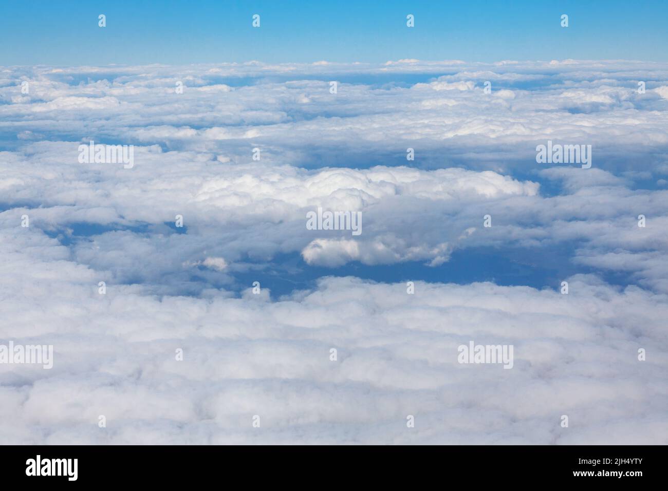 Clouds panorama view from the aircraft window . Flying in stratosphere