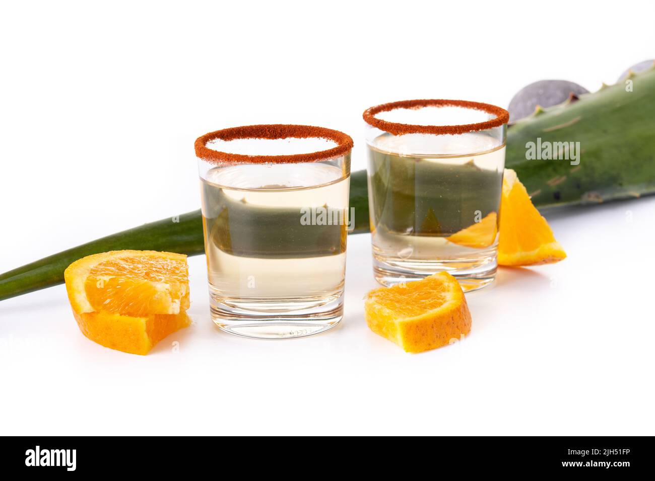 Mezcal Mexican drink with worm salt isolated on white background Stock