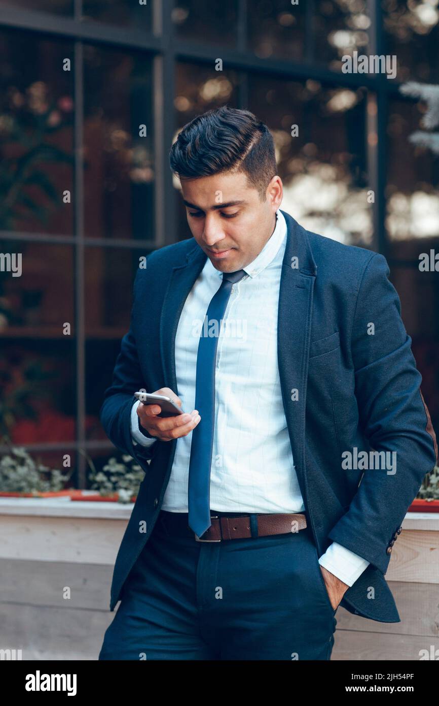 Confident and handsome male businessman Stock Photo