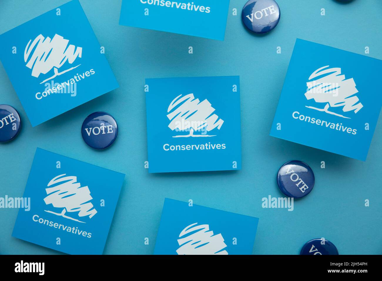 LONDON, UK - July 2022: Conservative United Kingdom political party logo with blue vote badges Stock Photo